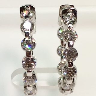 Diamond hoop earrings close up