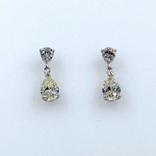 Round with Pear Shape Diamonds Earrings