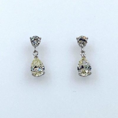 Round with Pear Shape Diamonds Earrings
